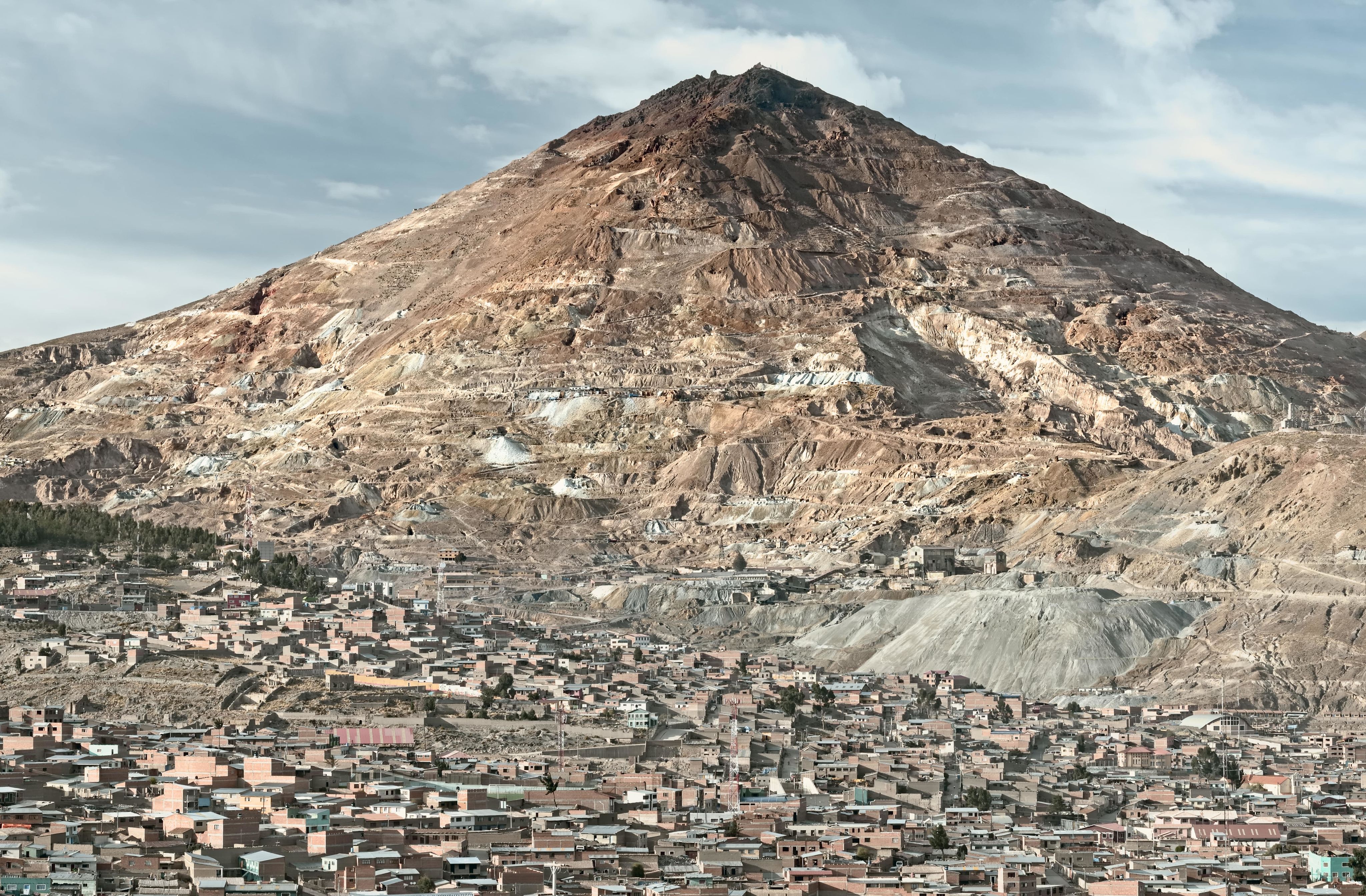 El Cerro Rico which translates " the rich hill" stands above what was once the largest silver deposit in the world, Potosi, Bolivia
