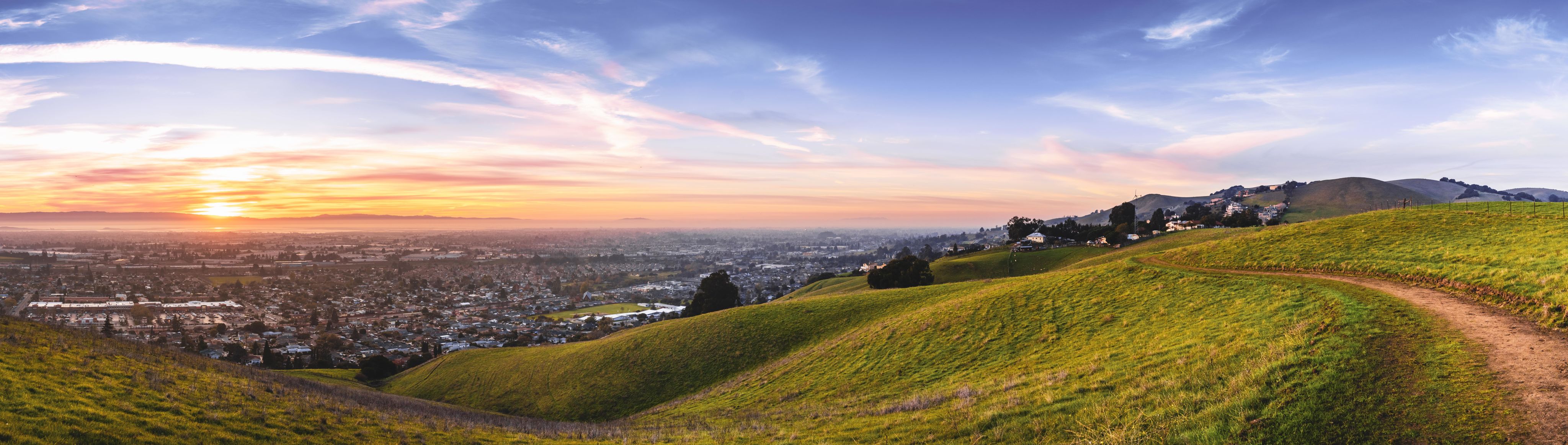 Sunset view over a valley community; California