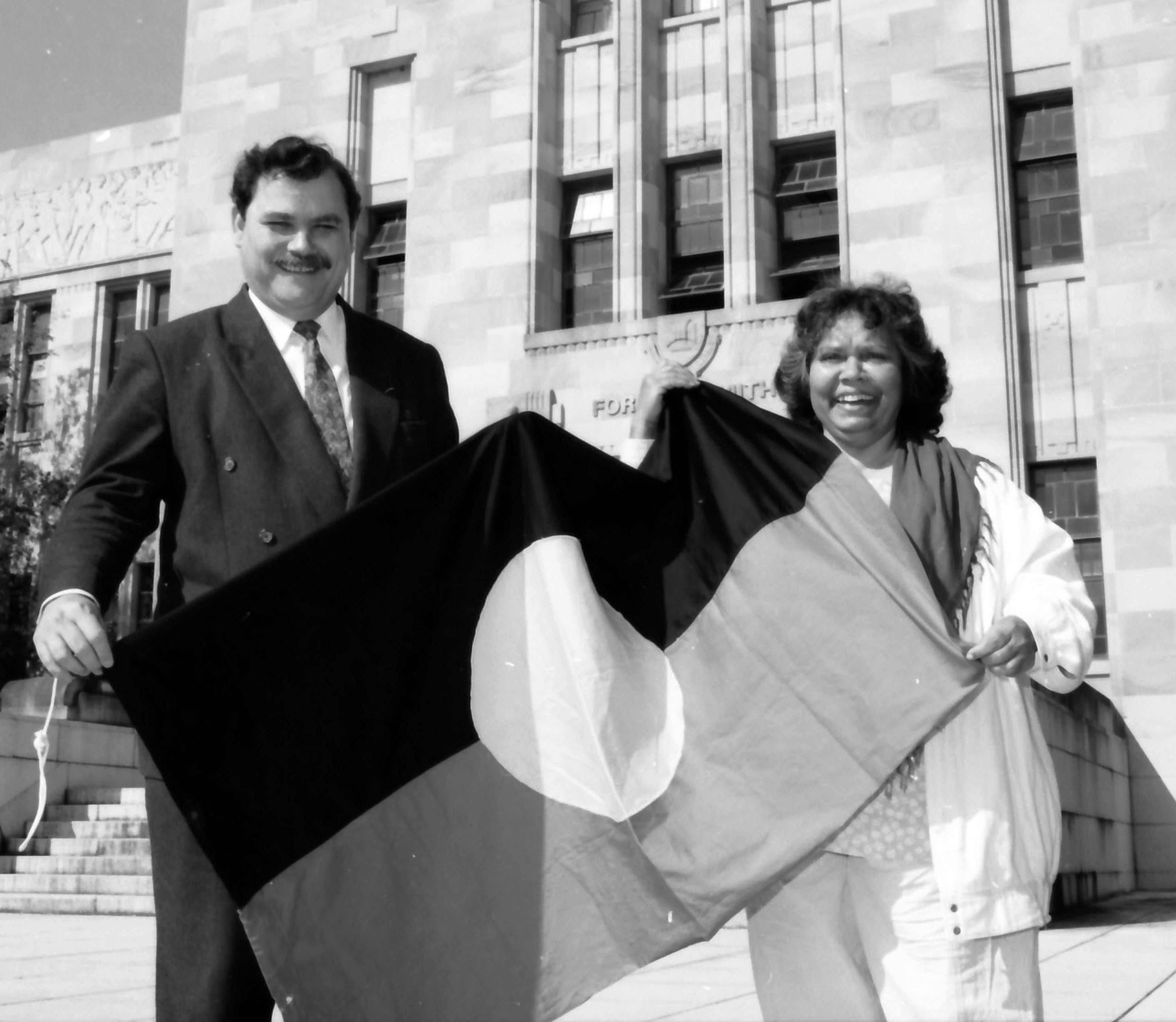 Adjunct Professor  Matt Foley and Aunt Lilla Watson were among those who attended a flag raising ceremony to mark Aboriginal and Islander Week (1992)