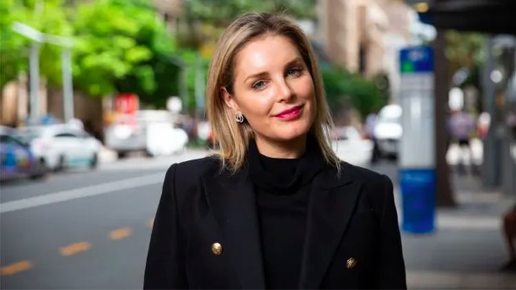 Image of Holly Tattersall standing on a street.
