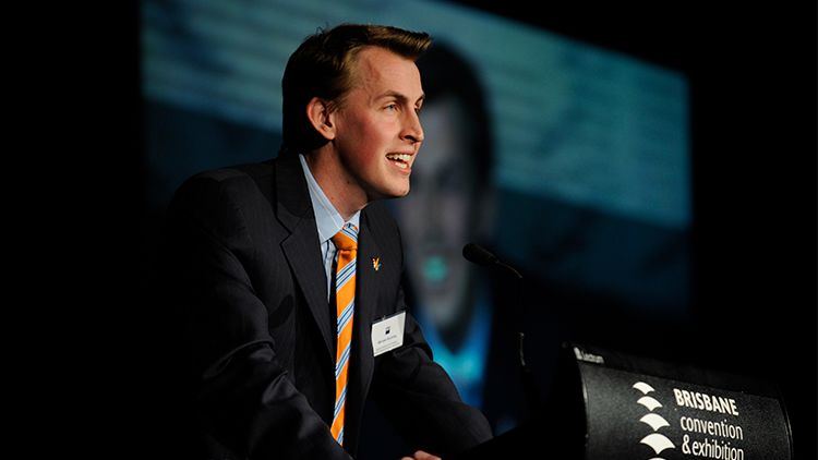 Image of Dr Michael Bonning standing at a lectern