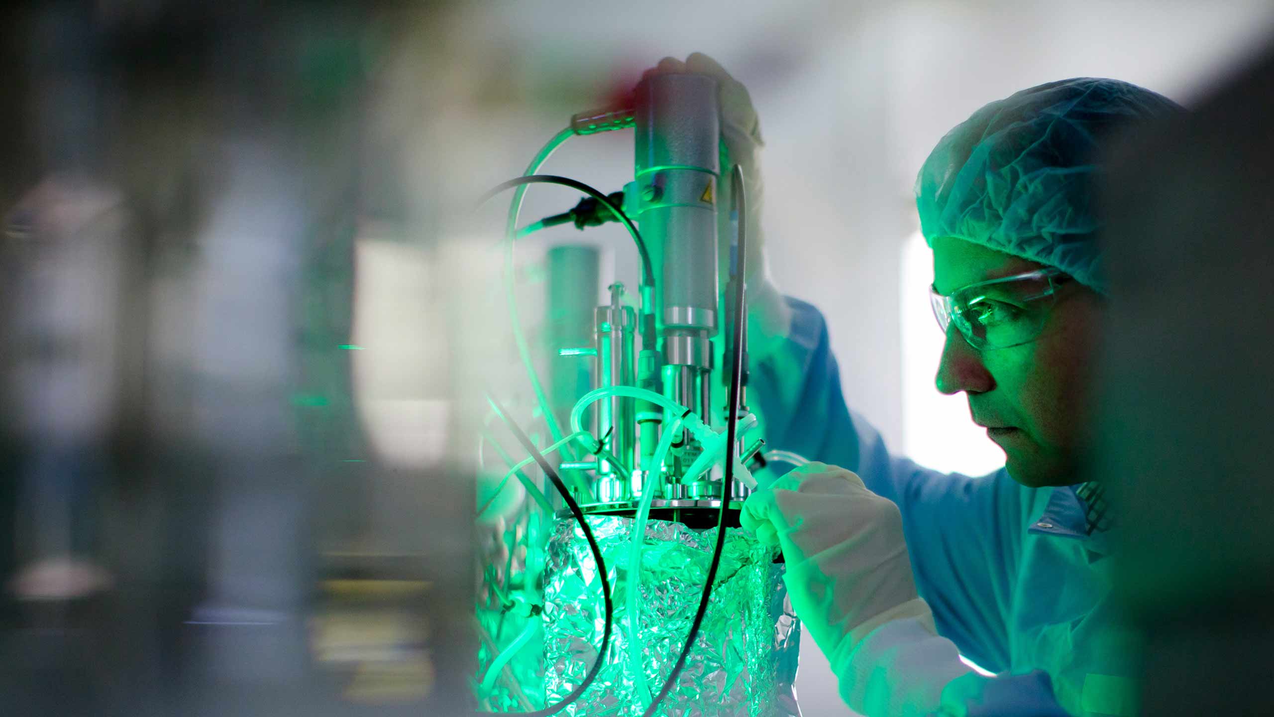 Professor Trent Munro with lab equipment