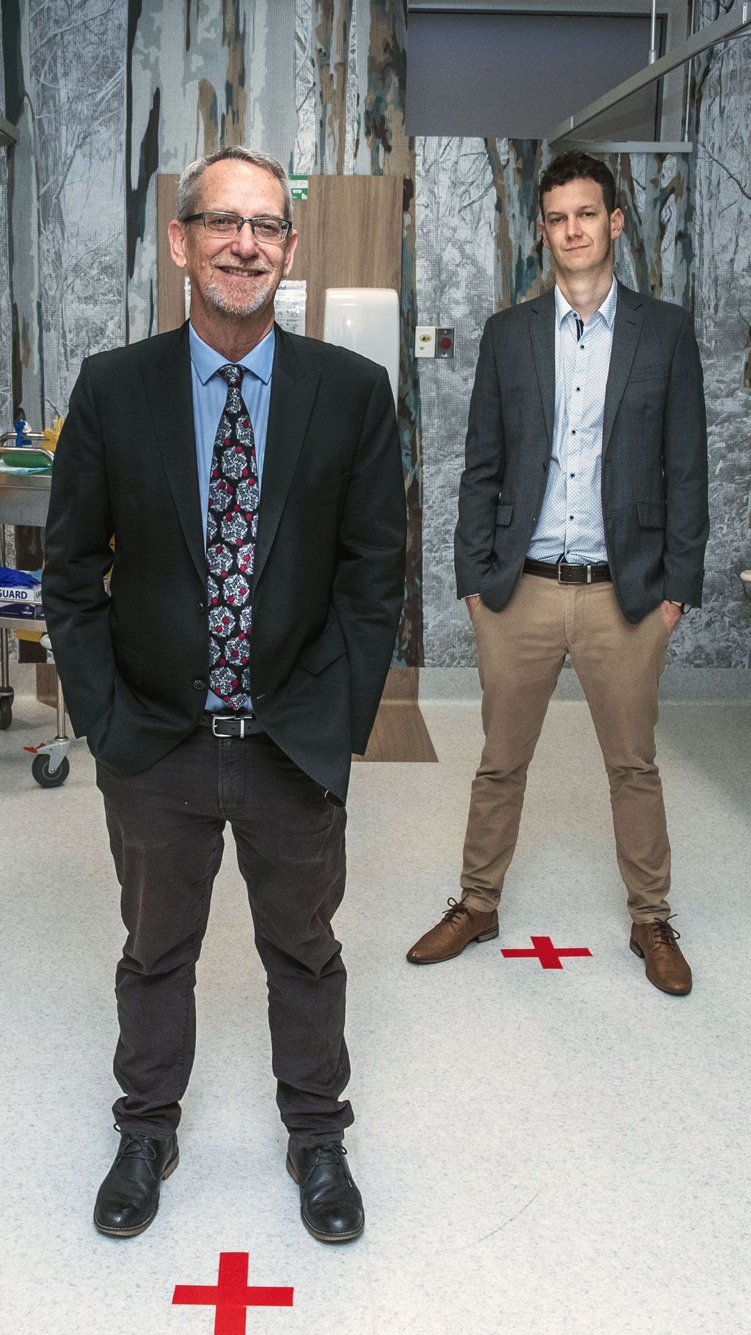 Image of Professor Paul Young and Associate Professor Keith Chappell COVID-19 Researcher in a hospital