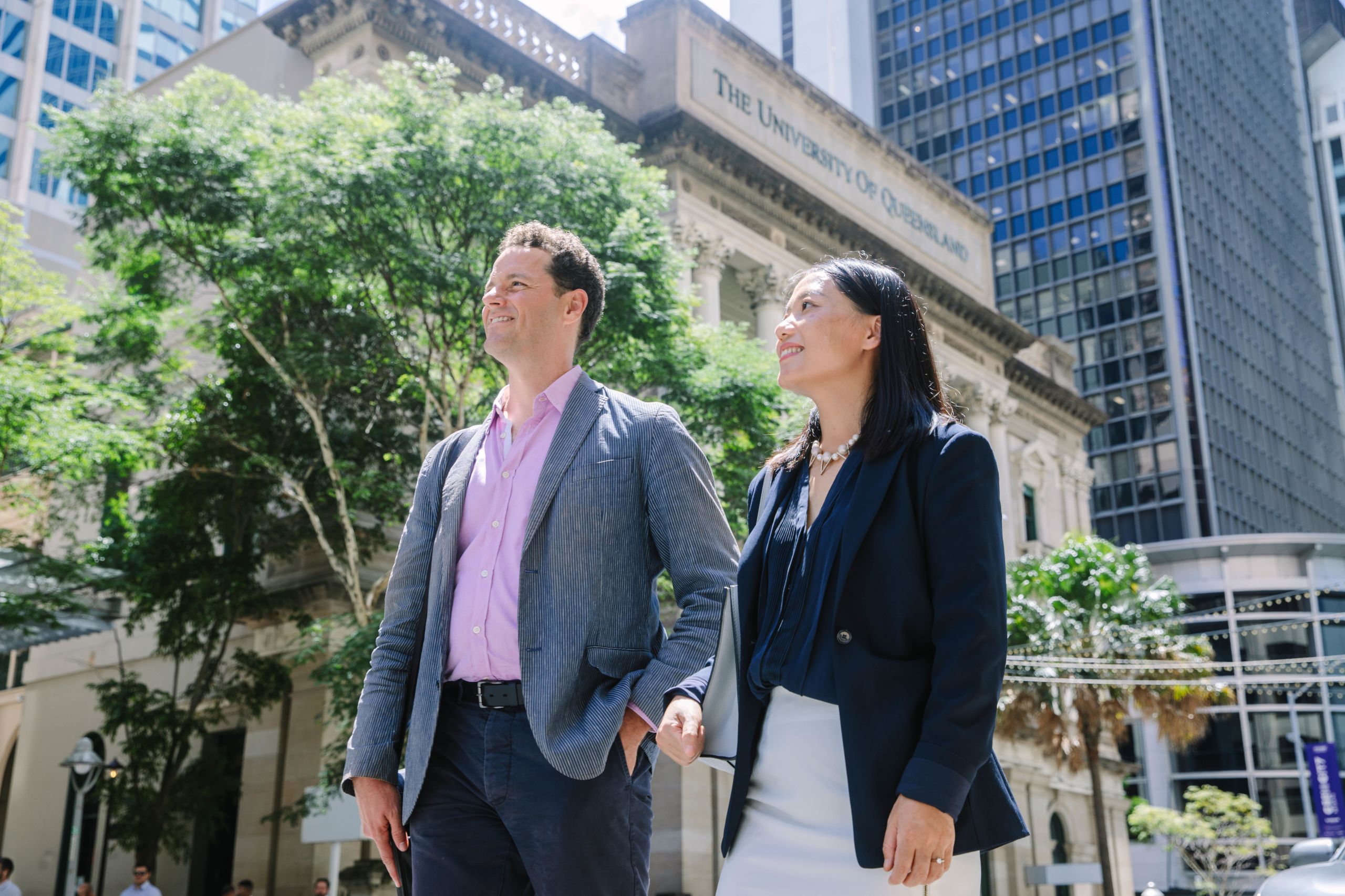 Graduates walking through Brisbane city