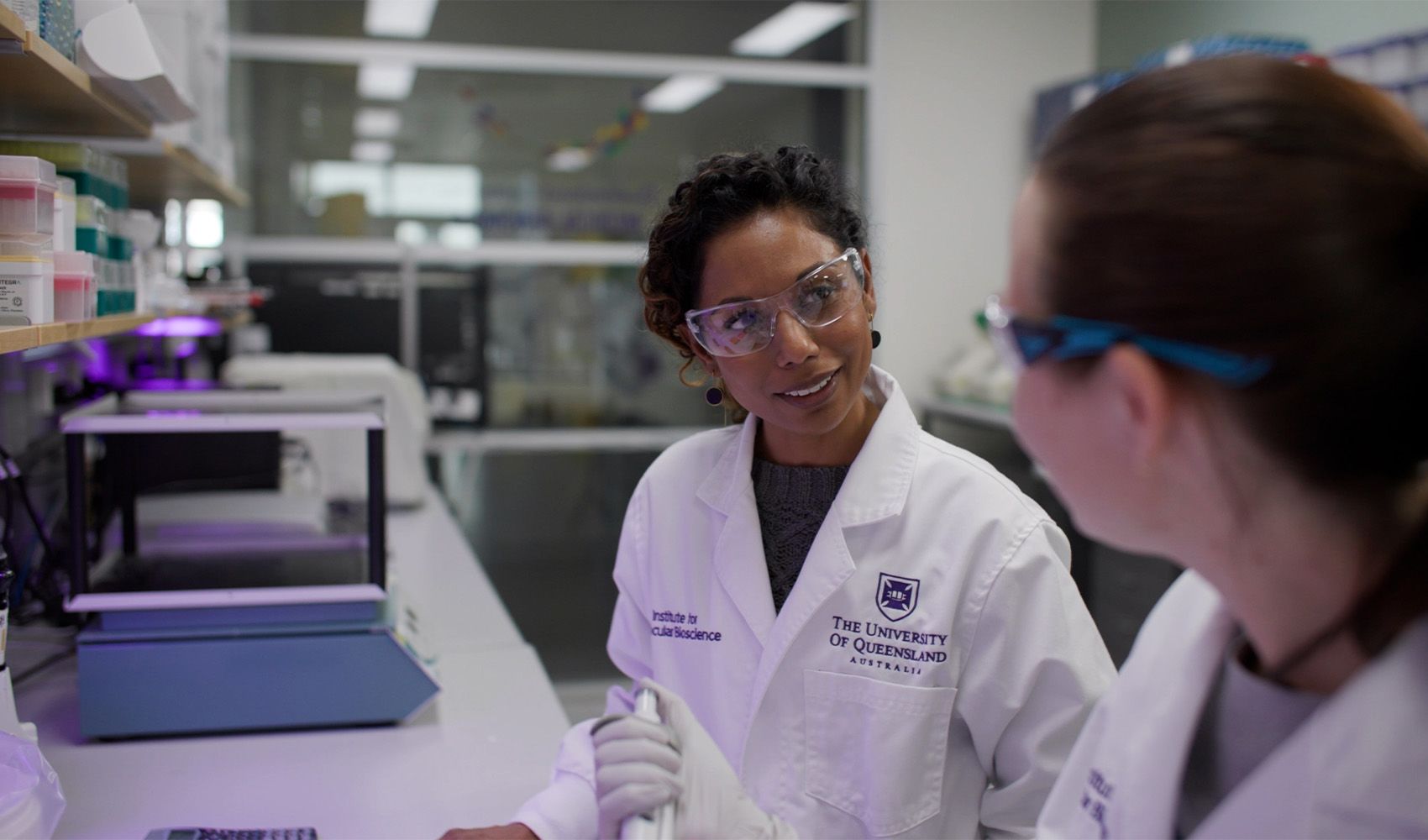 Associate Professor Sonia Shah in conversation with a colleague.