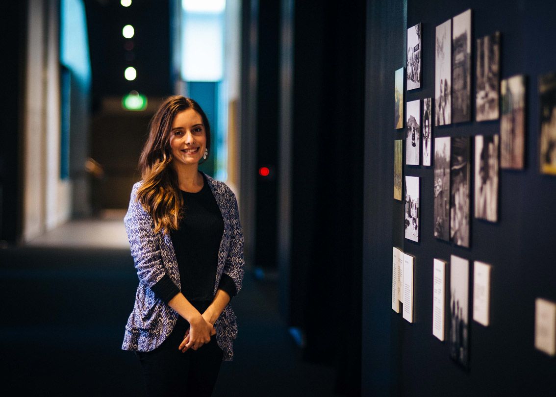 Former UQ Art Museum is pictured smiling in the Art Museum.