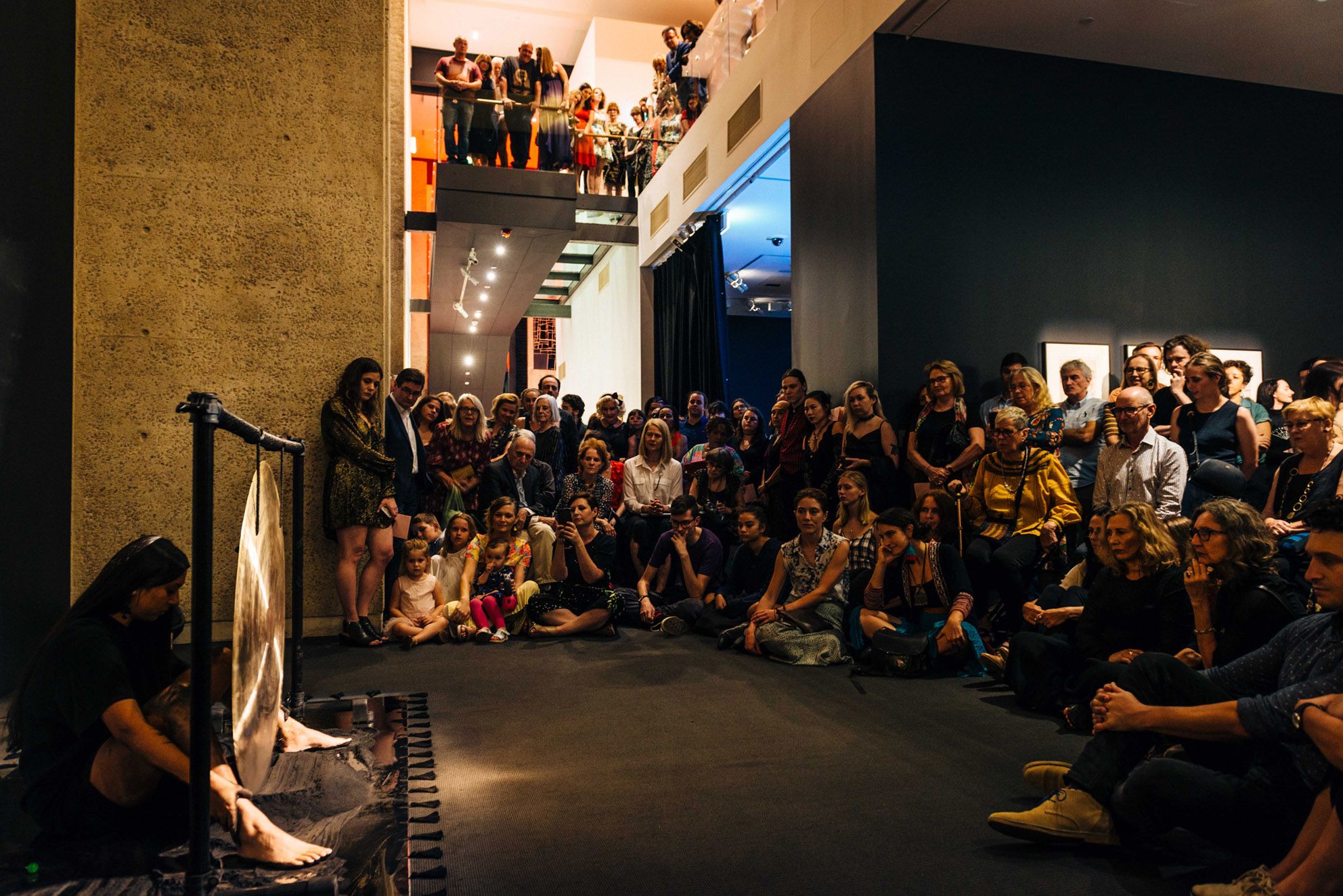 Artist Naomi Blacklock performs Aflame, A Singing Sun 2019 to a large gathered audience at the opening of Second Sight.