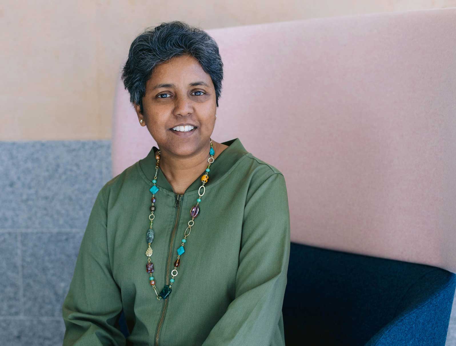 Associate Professor Renuka Mahadevan sitting down