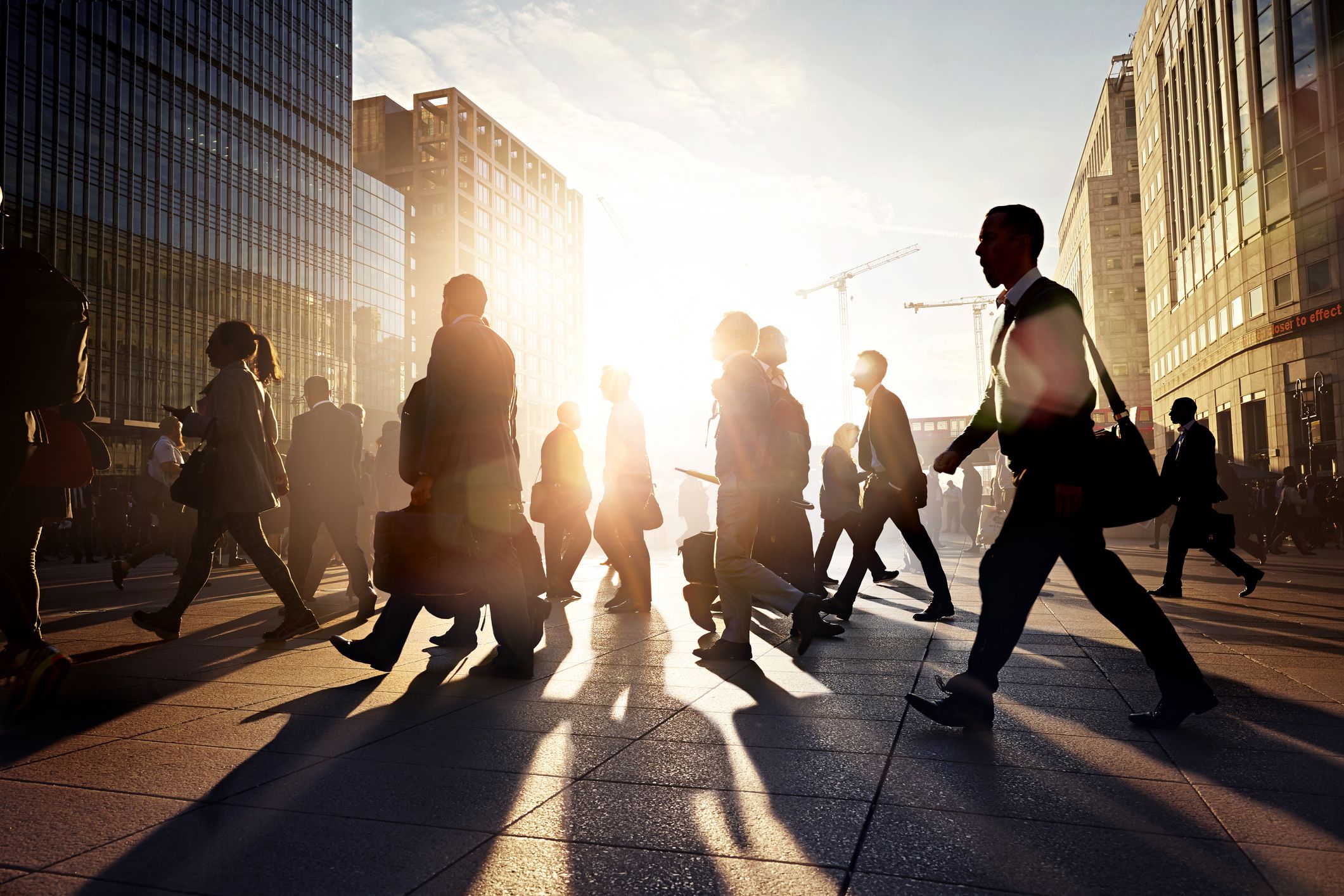 Employees walking to work in the city