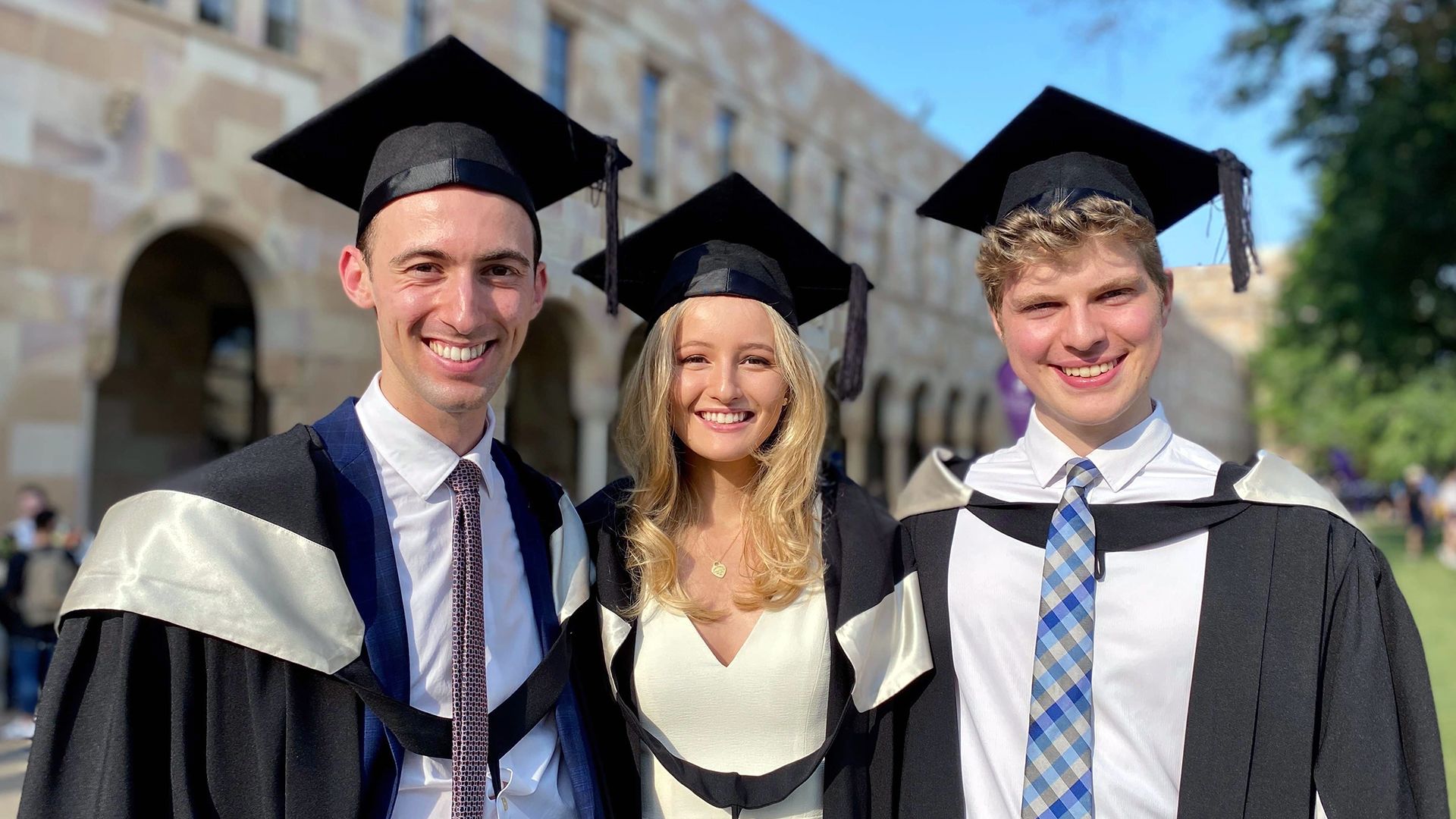 Kate Mann with friends graduating from a Bachelor of Advanced Finance and Economics (Honours)