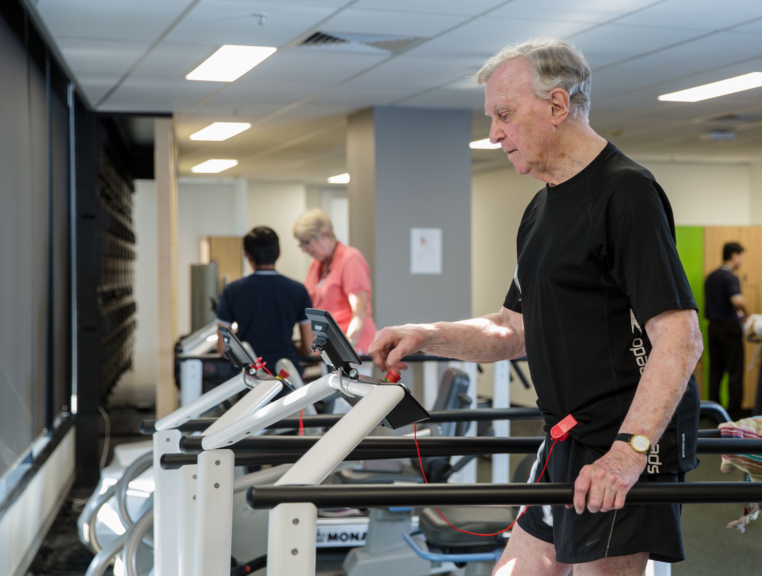 UQ Healthy Living client Desmond using treadmill in the clinic. 