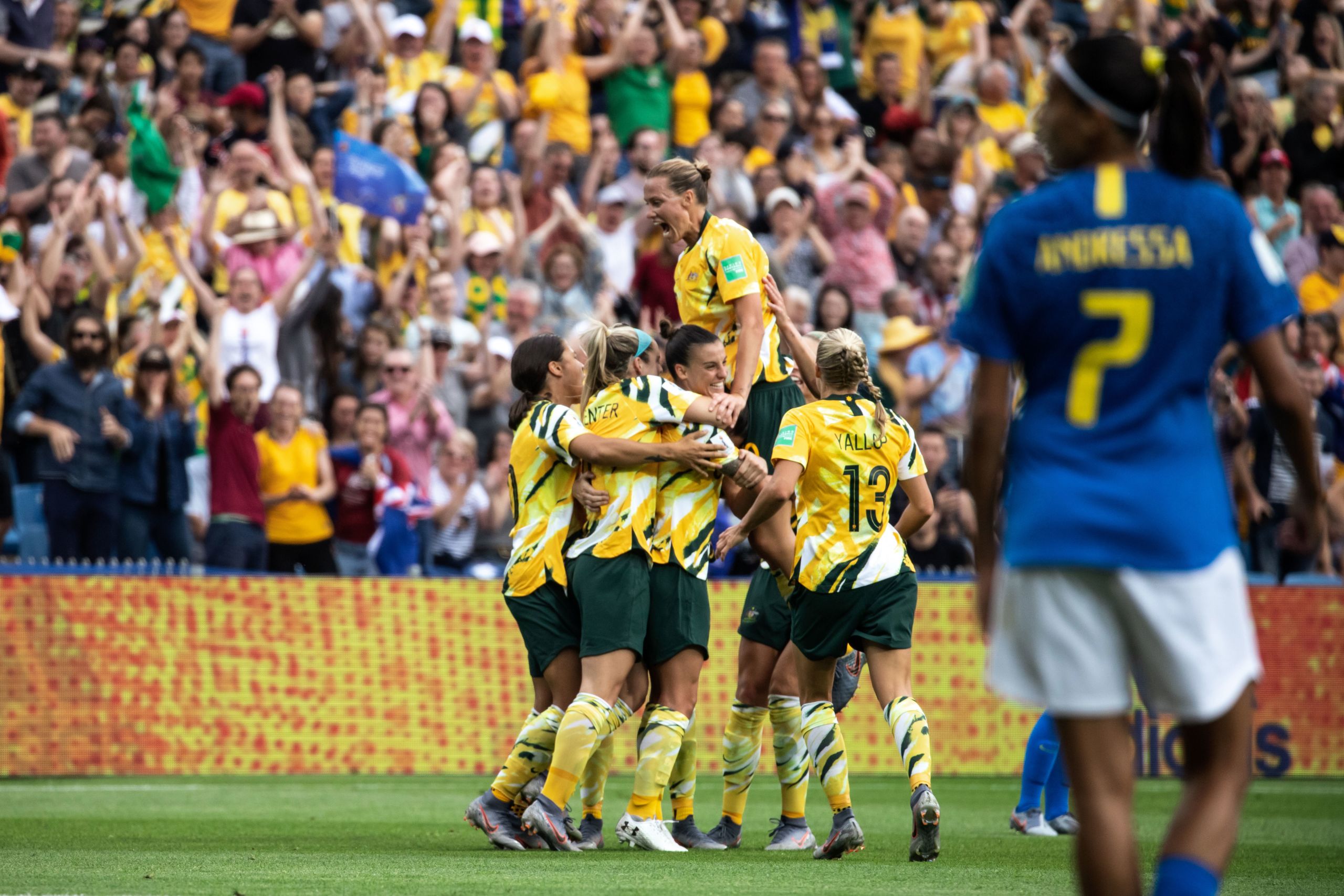 This is an image of the Matildas celebrating a victory in the 2019 FIFA World Cup
