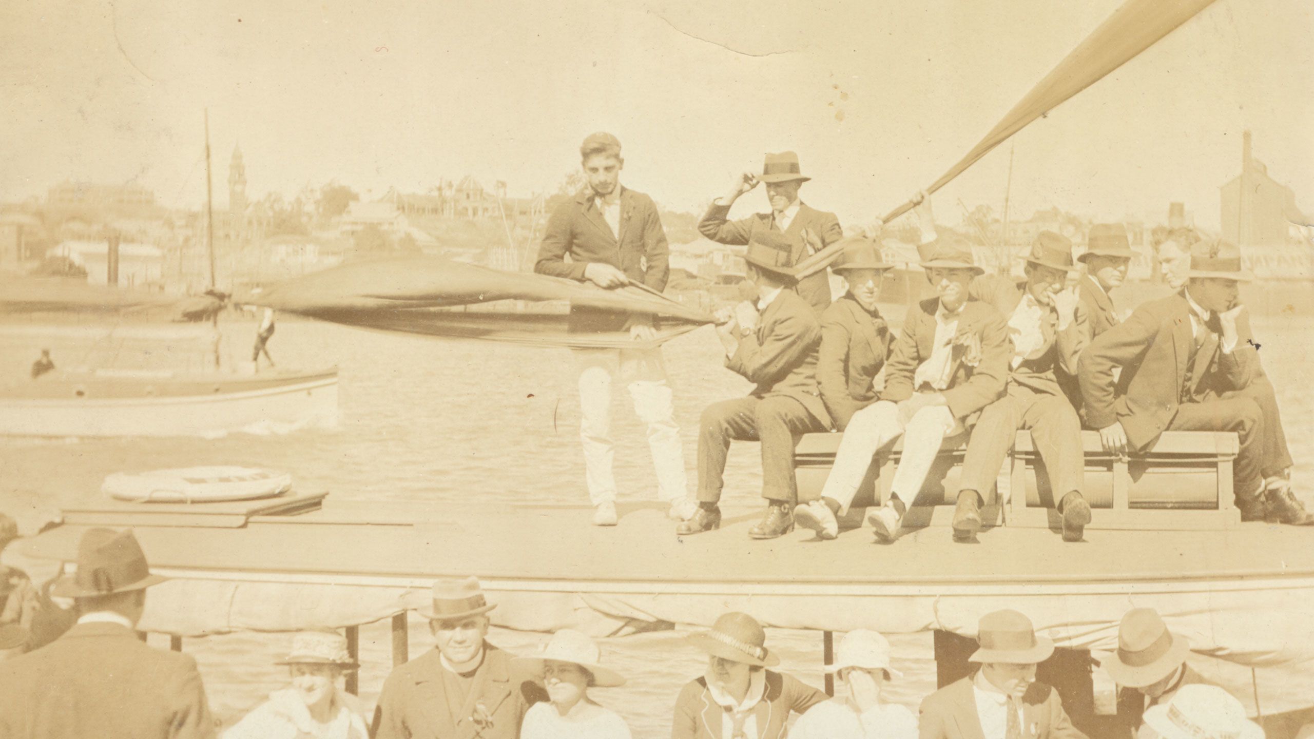 An image of the UQ crew before a boat race in 1919.