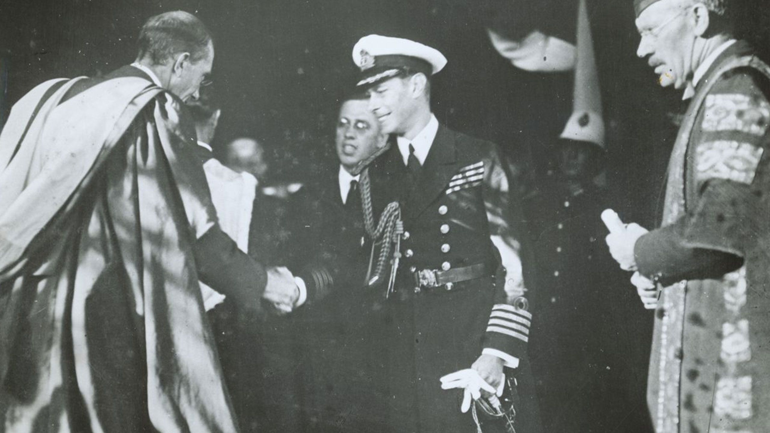 An image of Principal of Emmanuel College M Henderson (left) and UQ Vice-Chancellor WN Robertson (right) welcome the Duke of York (later King George VI) to the University in 1927.