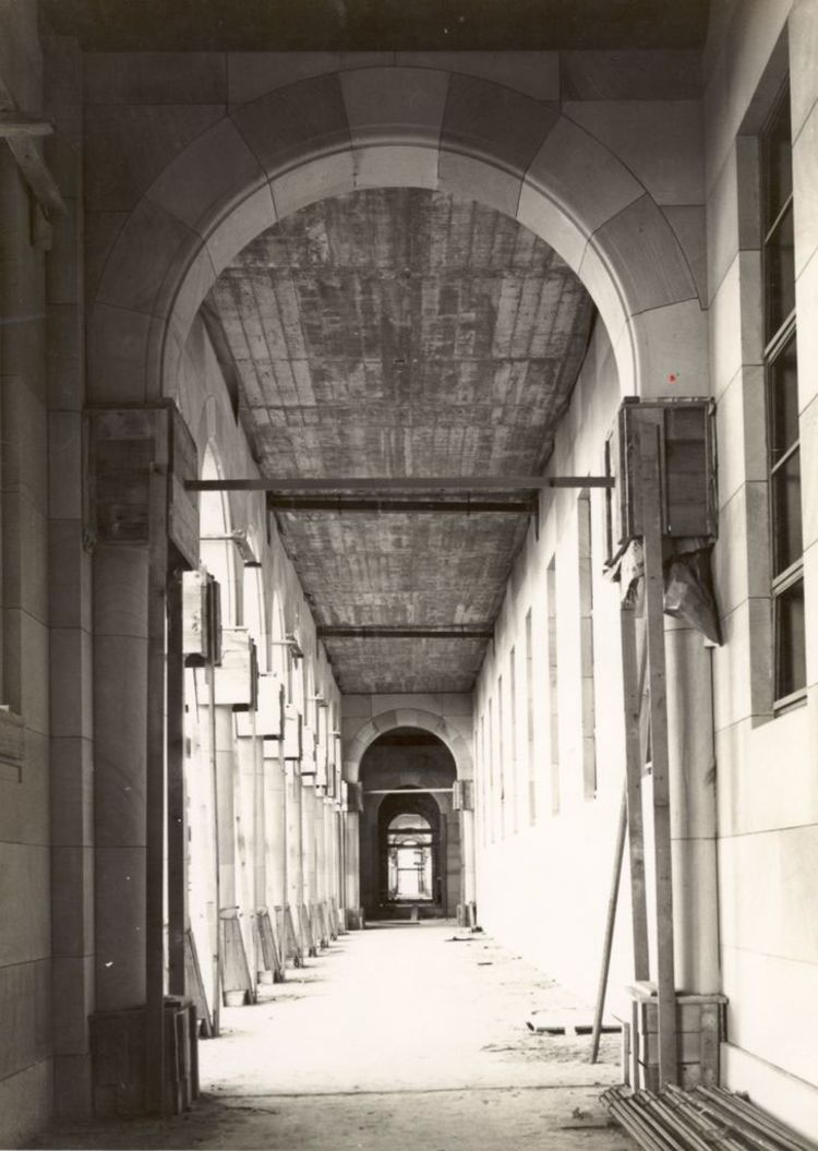 Image of the view along the cloisters of the Forgan Smith building during construction in 1940.