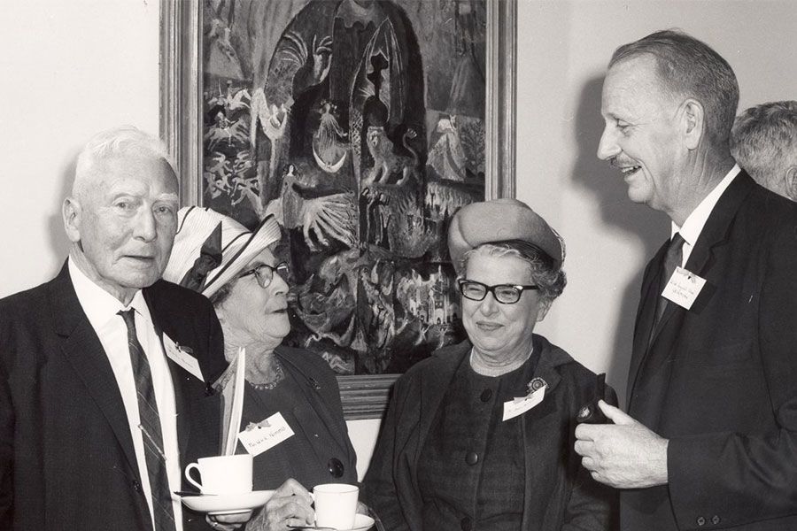 An image of Dr and Mrs WHR Nimmo, Dr Joan Allsop, and Lieutenant Colonel AS Gehrmann attending a morning tea in the UQ Senate Room on Open Day in 1967.