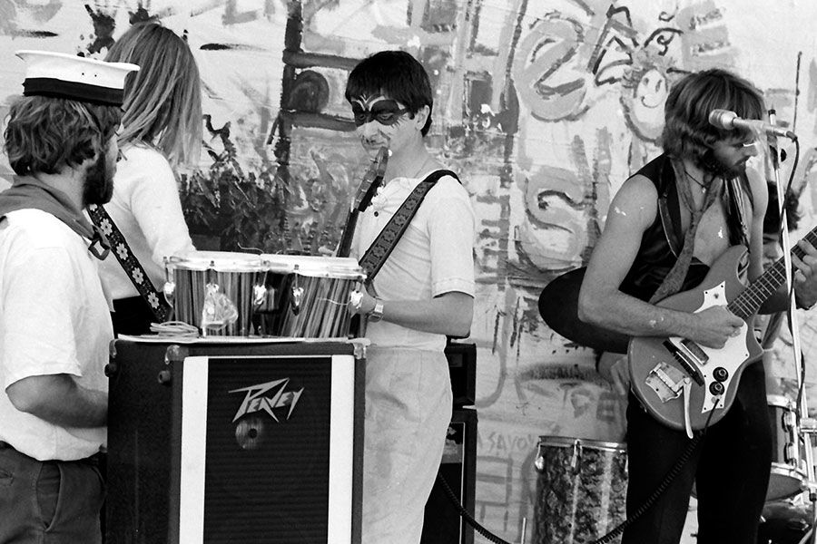 An image of a band tuning up for a performance on Open Day in 1979.