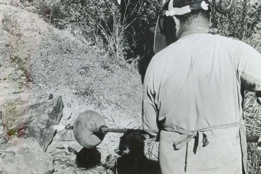 An image of a rock-boring drill demonstrated at Julius Kruttschnitt Mineral Research Centre at Indooroopilly.