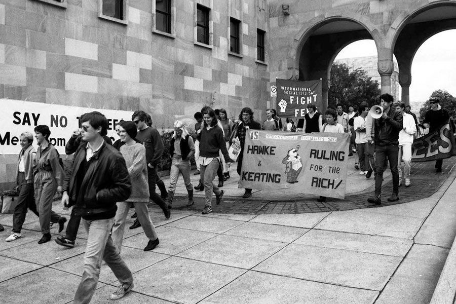 An image of students protesting over increased student fees in 1987.