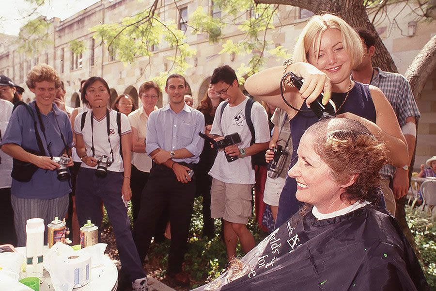A crowd gathers for Shave for a Cure day at UQ's St Lucia campus in 2000.