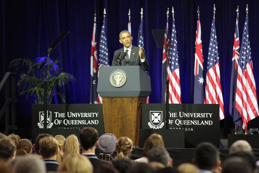 An image of President Barack Obama addressing a large crowd at UQ St Lucia in November 2014.