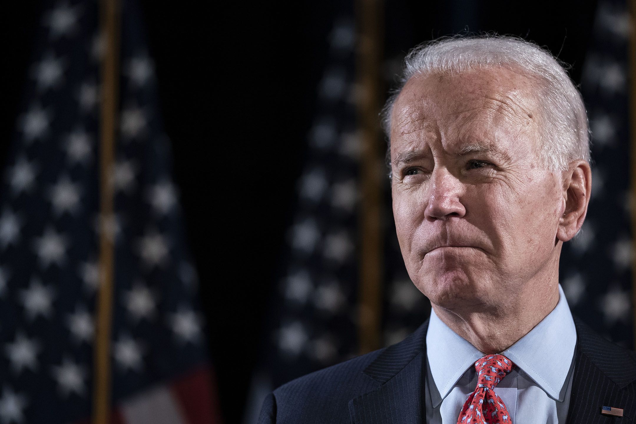 Joe Biden looks sternly into the middle distance