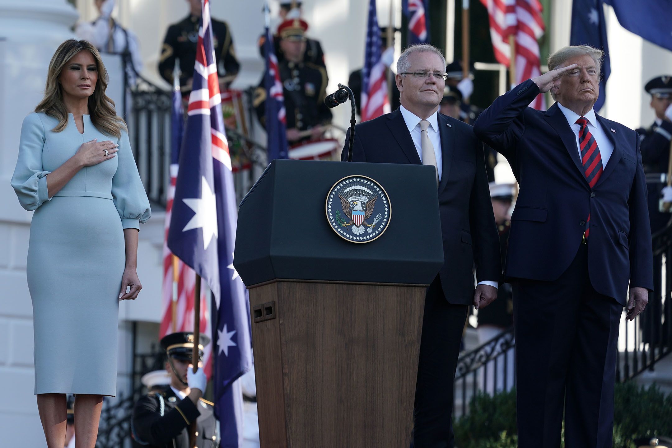 An image of Australian Prime Minister Scott Morrison with US President Donald Trump and the First Lady Melania Trump.