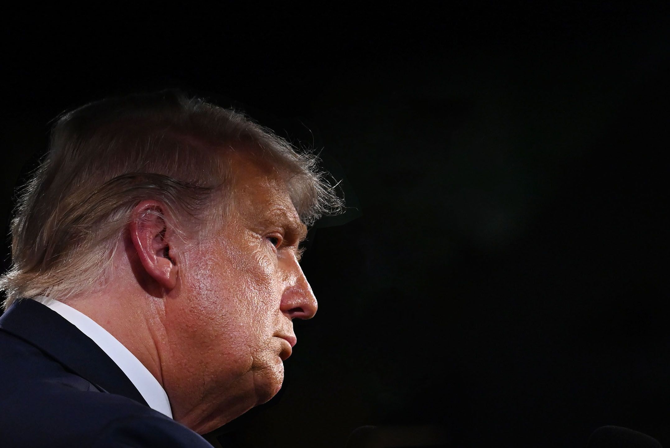 Donald Trump looks over his shoulder