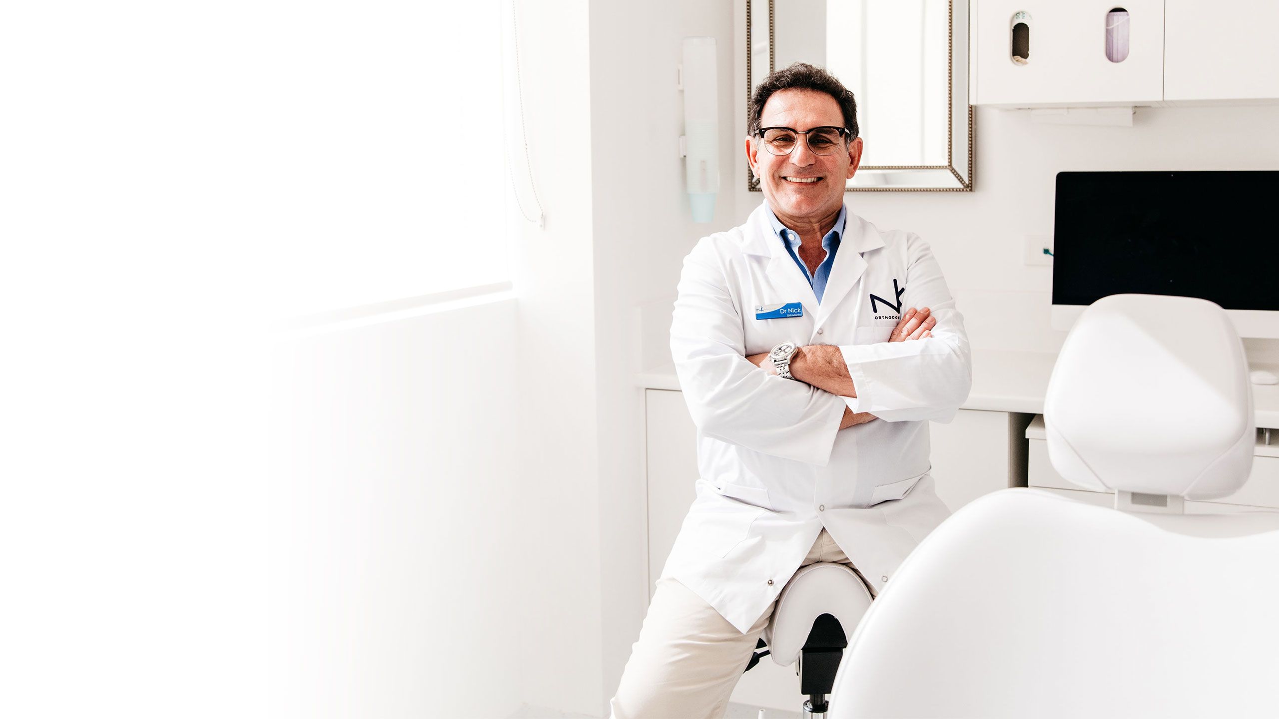 An image of orthodontist and UQ alumnus Dr Nick Kotsomitis in his surgery.