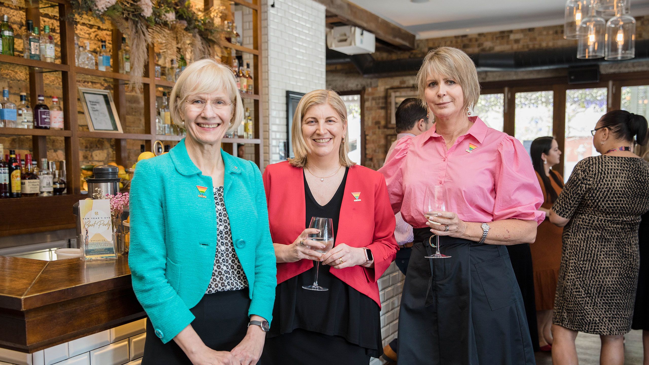 UQ Vice-Chancellor and President Professor Deborah Terry AO, Deputy Vice-Chancellor (Research and Innovation) Professor Bronwyn Harch, and Associate Director of Workplace Diversity and Inclusion Dr Dee Gibbon OAM CSC in Merle's Bar at the Regatta Hotel.