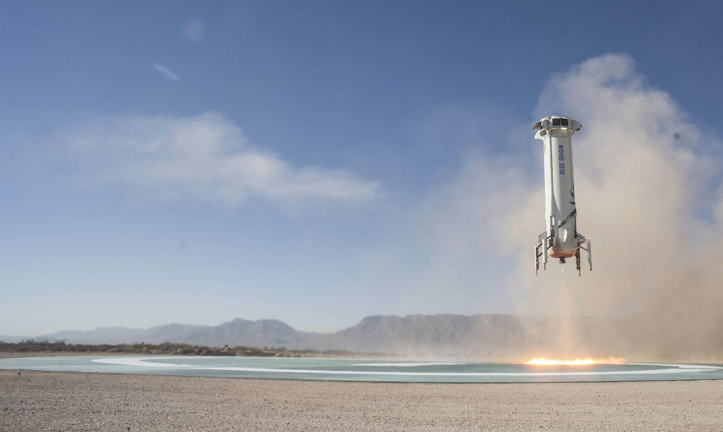 An image of the New Shepard booster landing.