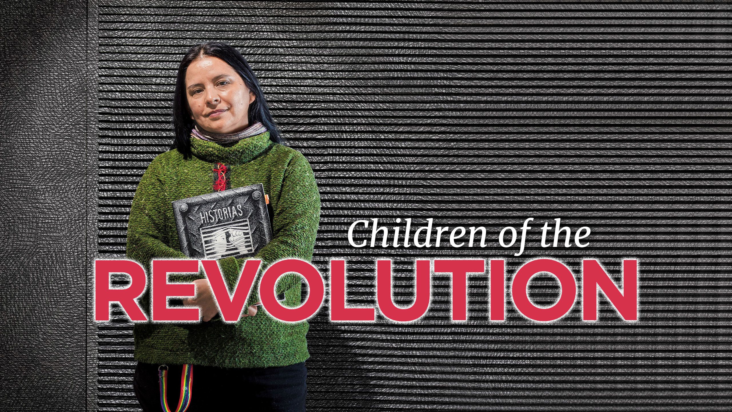 An image of Dr Sol Rojas-Lizana, who grew up in Chile during the military dictatorship of former president Augusto Pinochet. She is holding the graphic novel she co-authored, called 'Historias Clandestinas'.