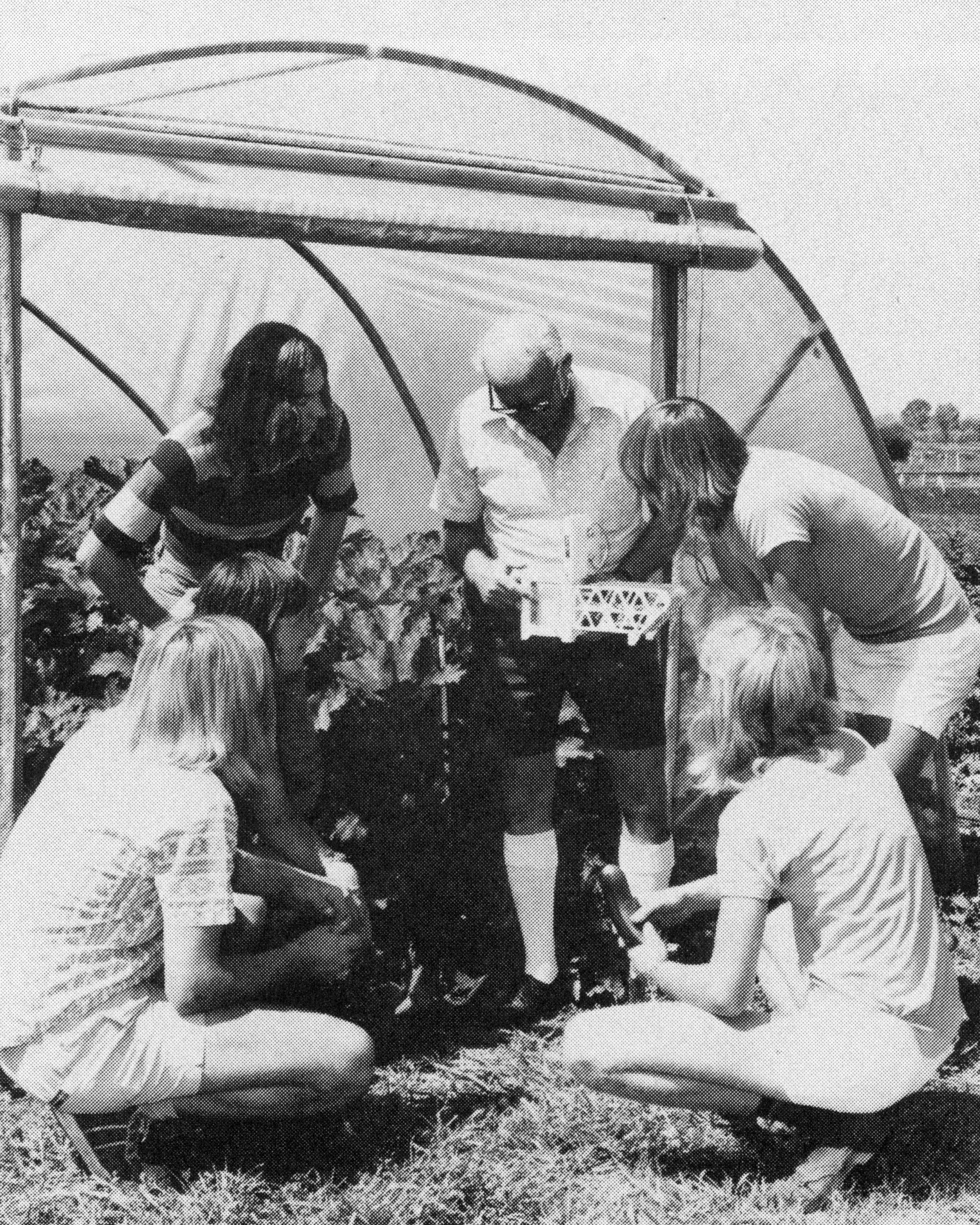QAC students in a greenhouse in 1975.