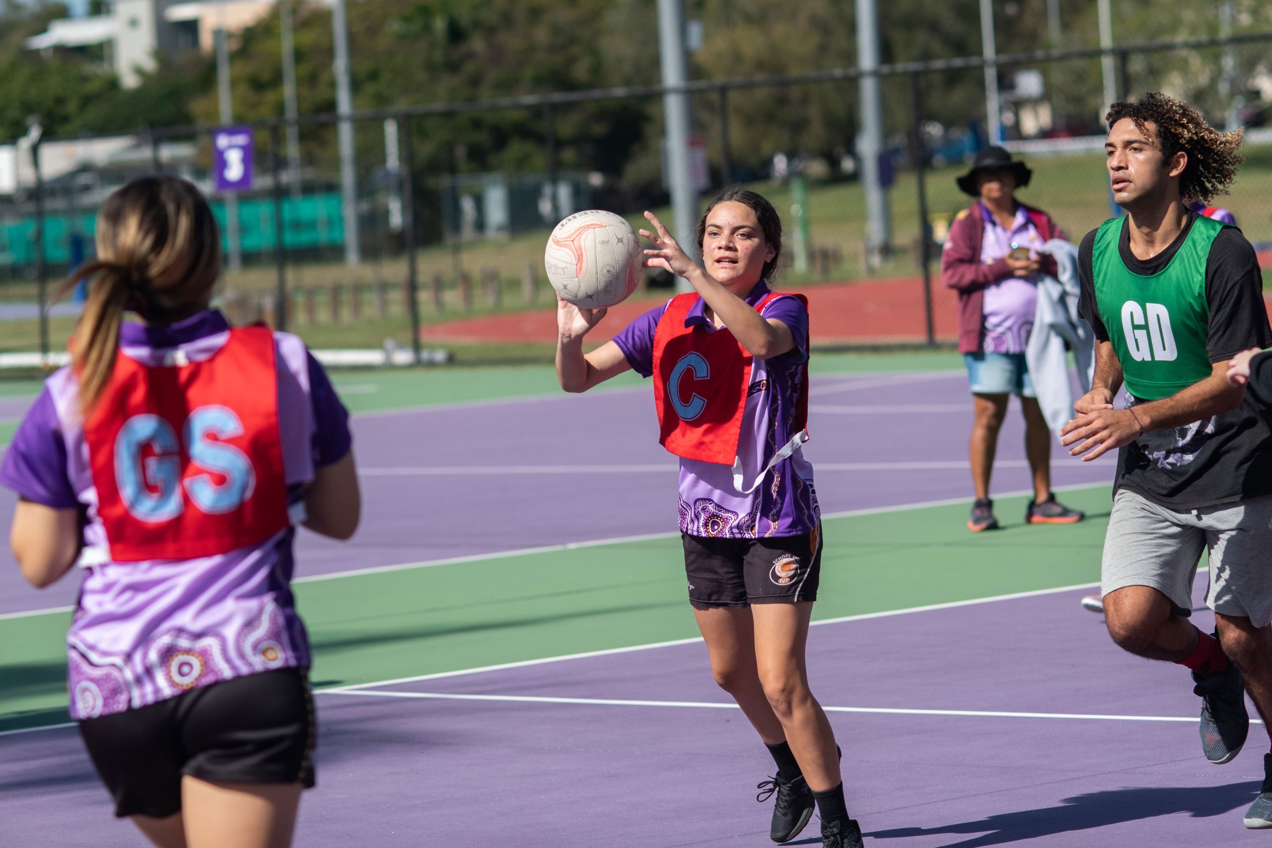 An image of Diamond Spirit camp participants playing a a friendly game of netball with UQ’s Goorie Berrimpa Student Collective.