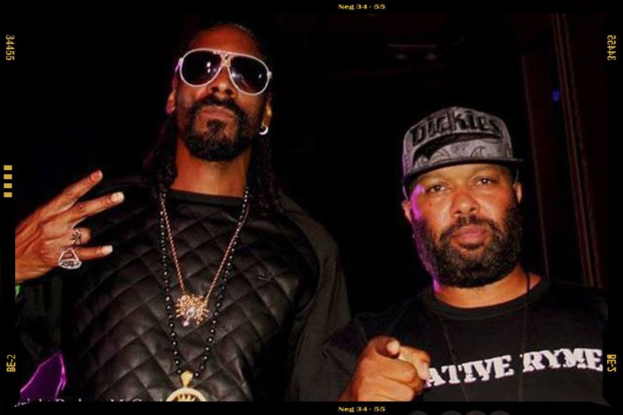 An image of Cameron Callope with international rap superstar Snoop Dogg.