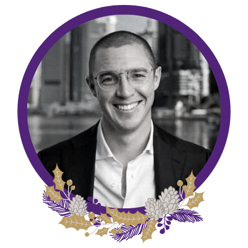Black and white image of Dr James Fielding. The image has a purple circular border with a purple and gold native wreath at the bottom.