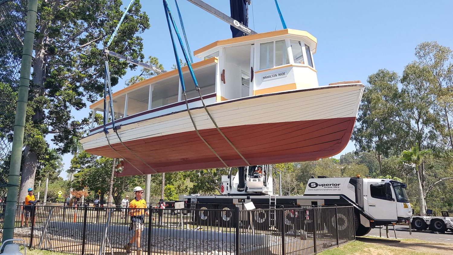The ferry being craned into place for display at UQ's St Lucia campus.
