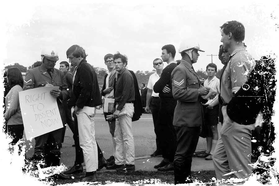 An image of Queensland police questioning UQ students during a protest in 1967.