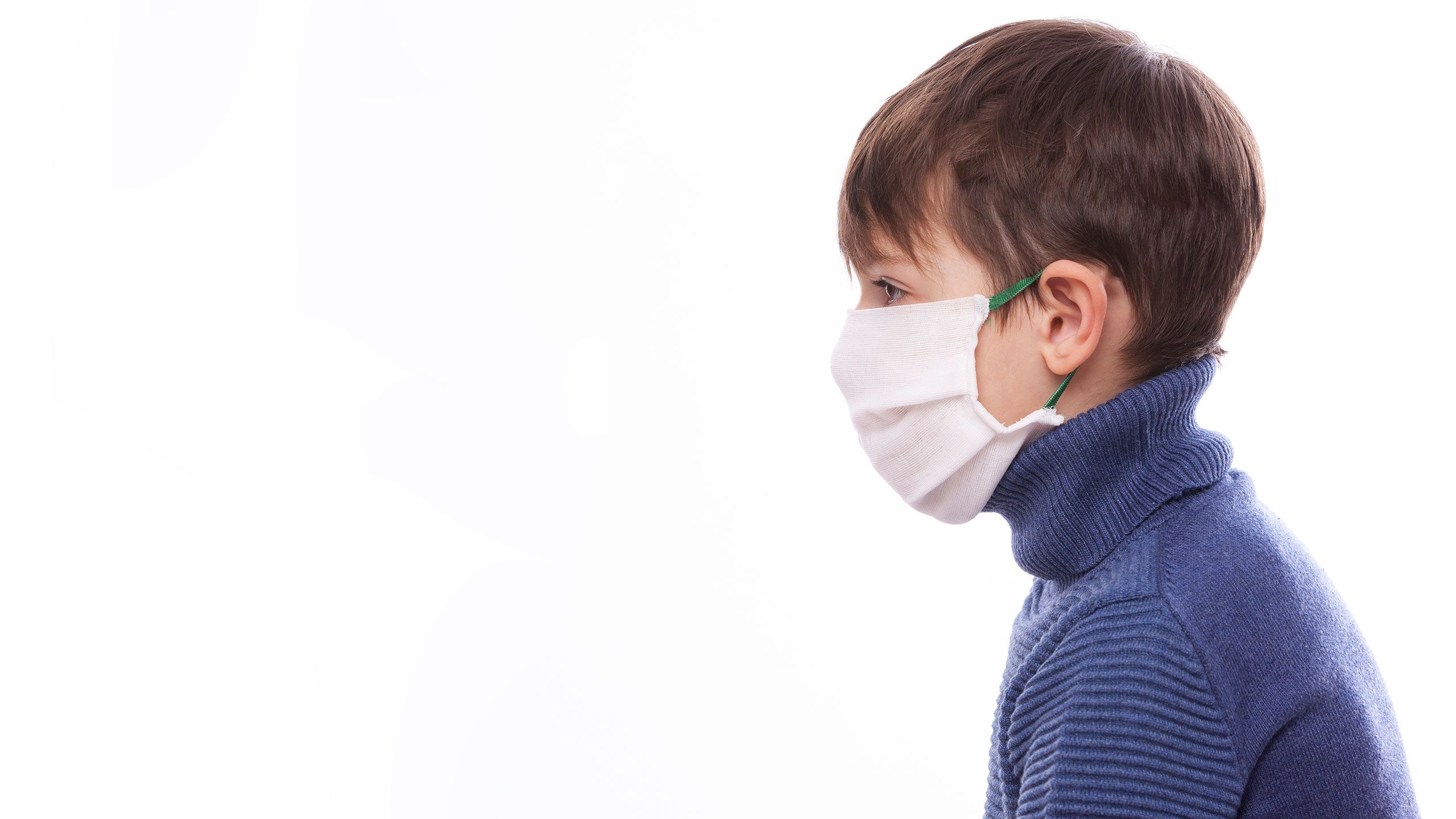 A child in a medical mask during the coronovirus in the world.