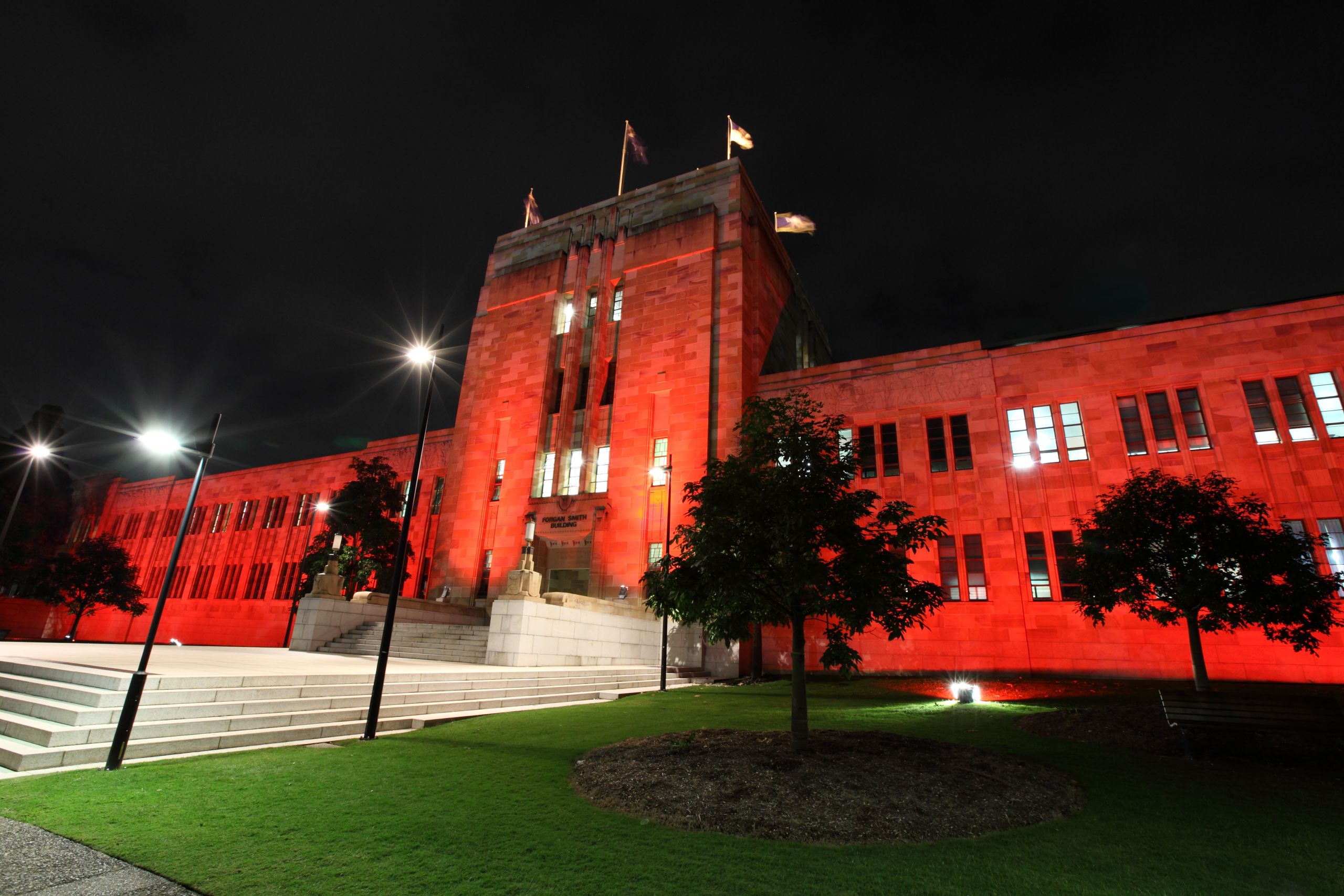 Forgan Smith building's red lighting at UQ St Lucia.