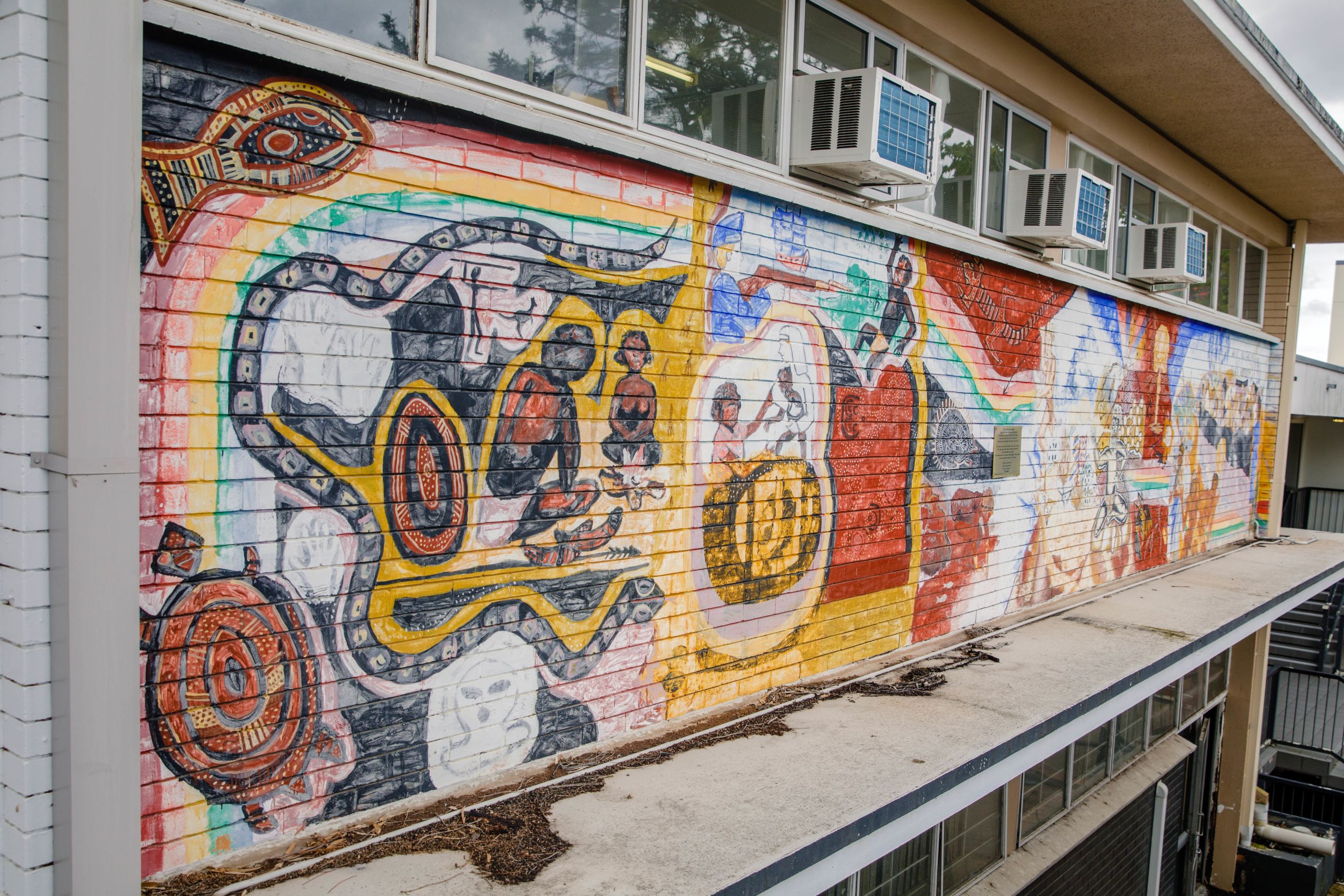 Wall mural of 'White Australia has a black history'.