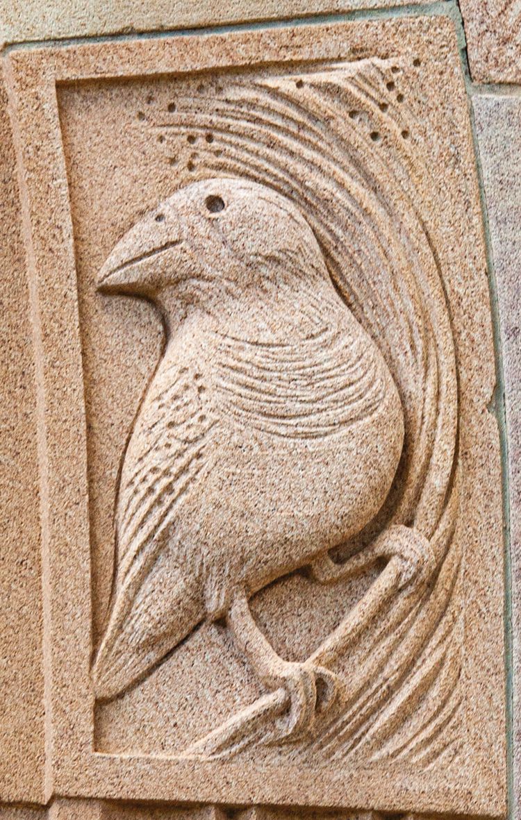 Arch carving of a zebra finch.