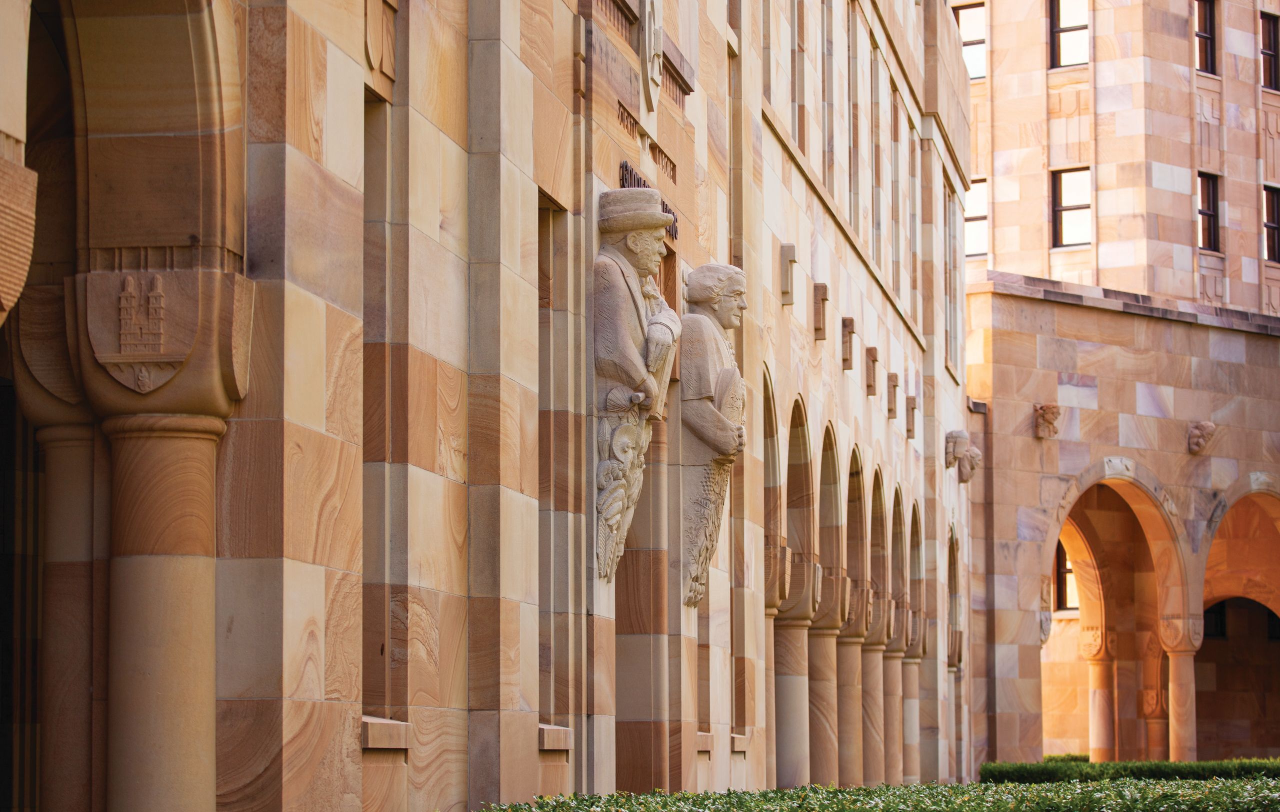 Sculptures of Charles Darwin and Gregor Mendel.