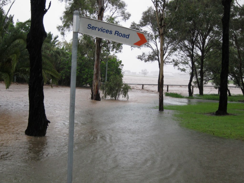 An image of Services Road at UQ's Gatton campus submerged during the floods in 2011.