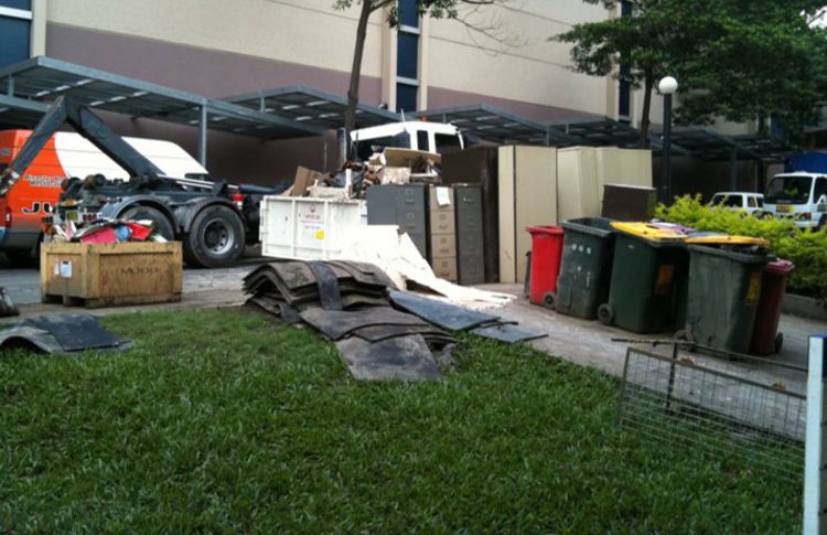 An image of filing cabinets and equipment pulled out of buildings.