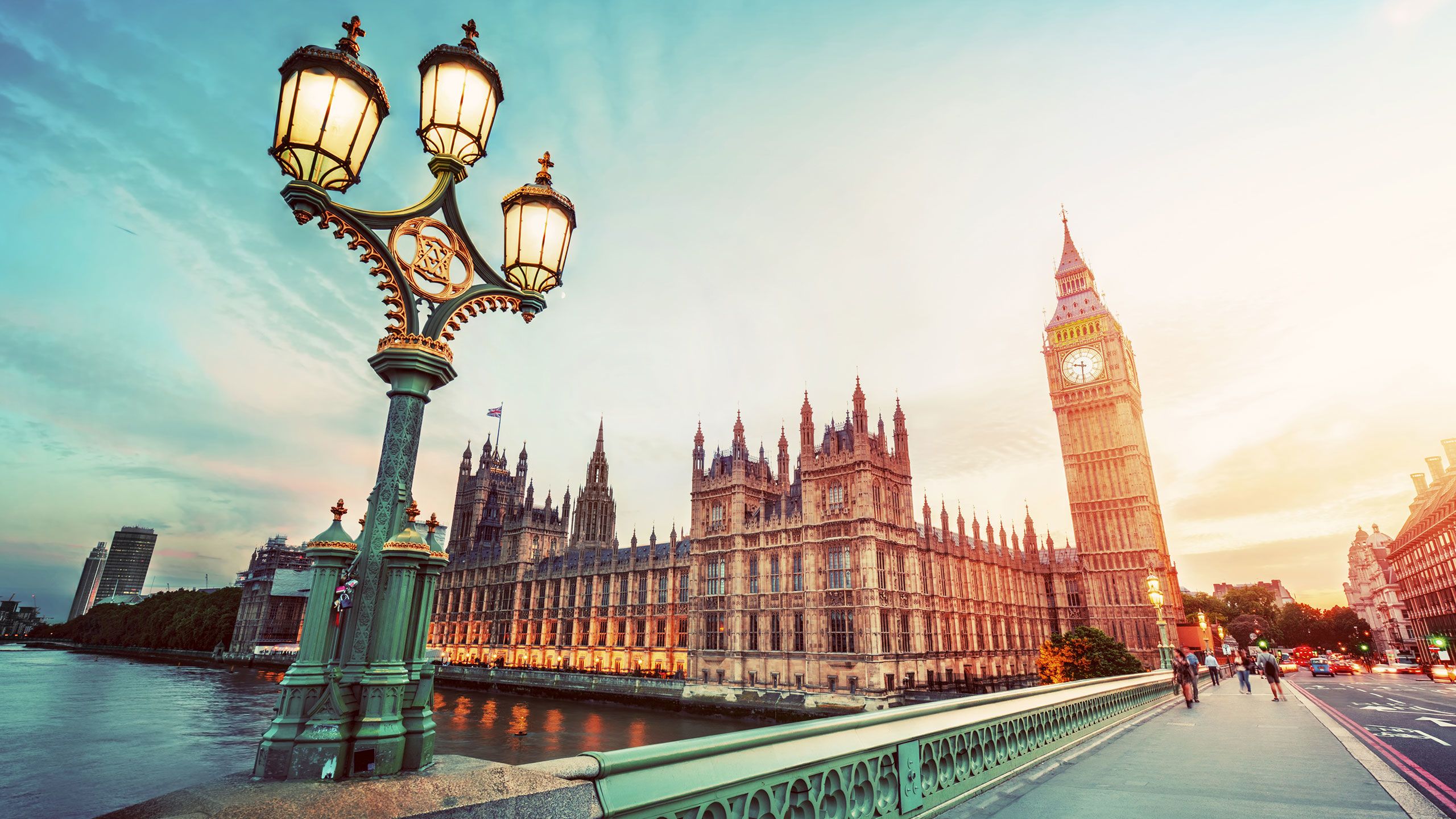 Big Ben, London the UK at sunset. Retro street lamp light on Westminster Bridge.