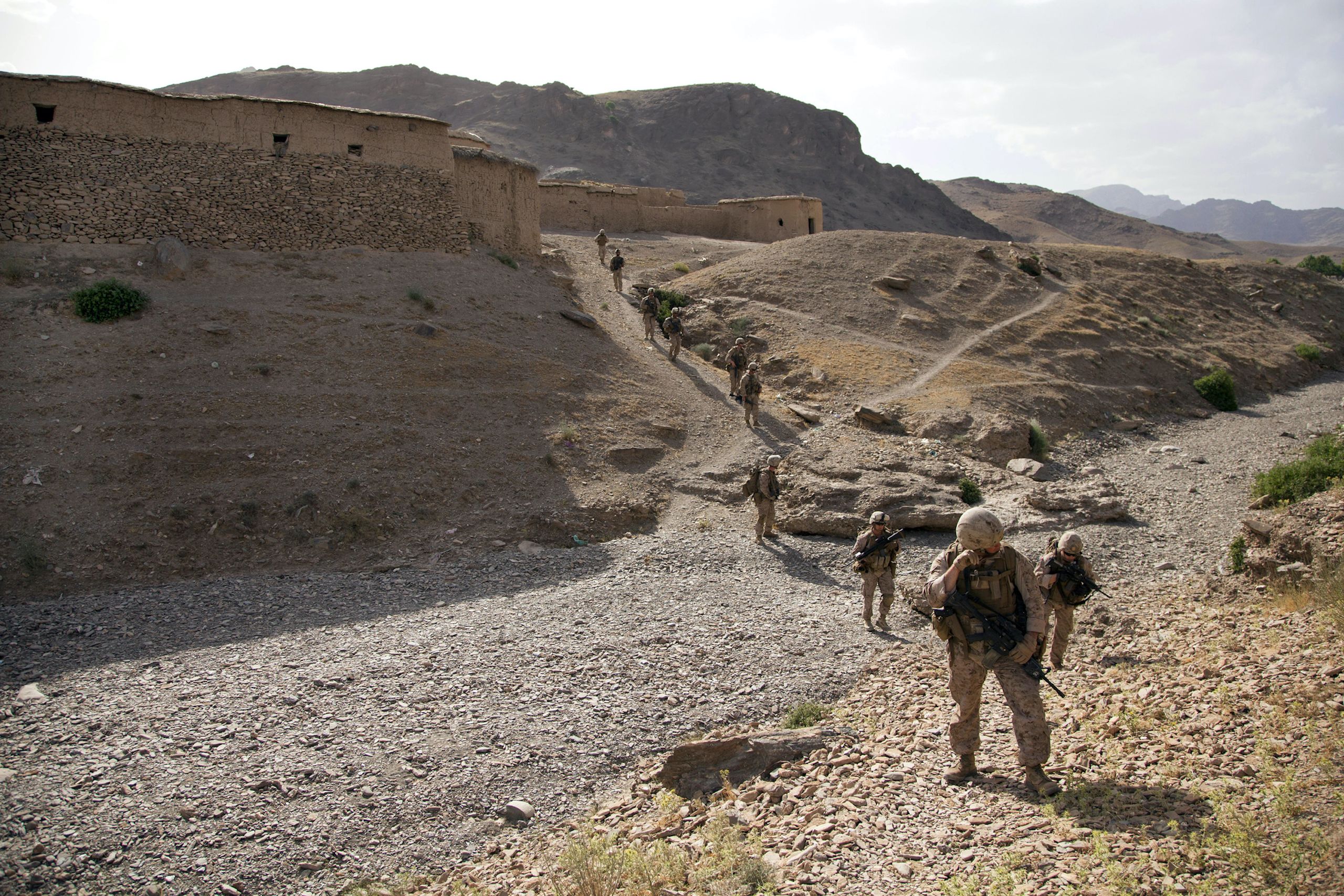 US Marines patrol a village during Operation Nightmare in Now Zad, Helmand province, Afghanistan on 6 June, 2013.