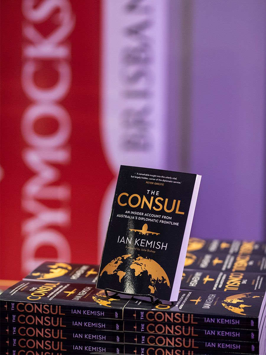 An image of copies of the The Consul, written by Ian Kemish and published by UQP.