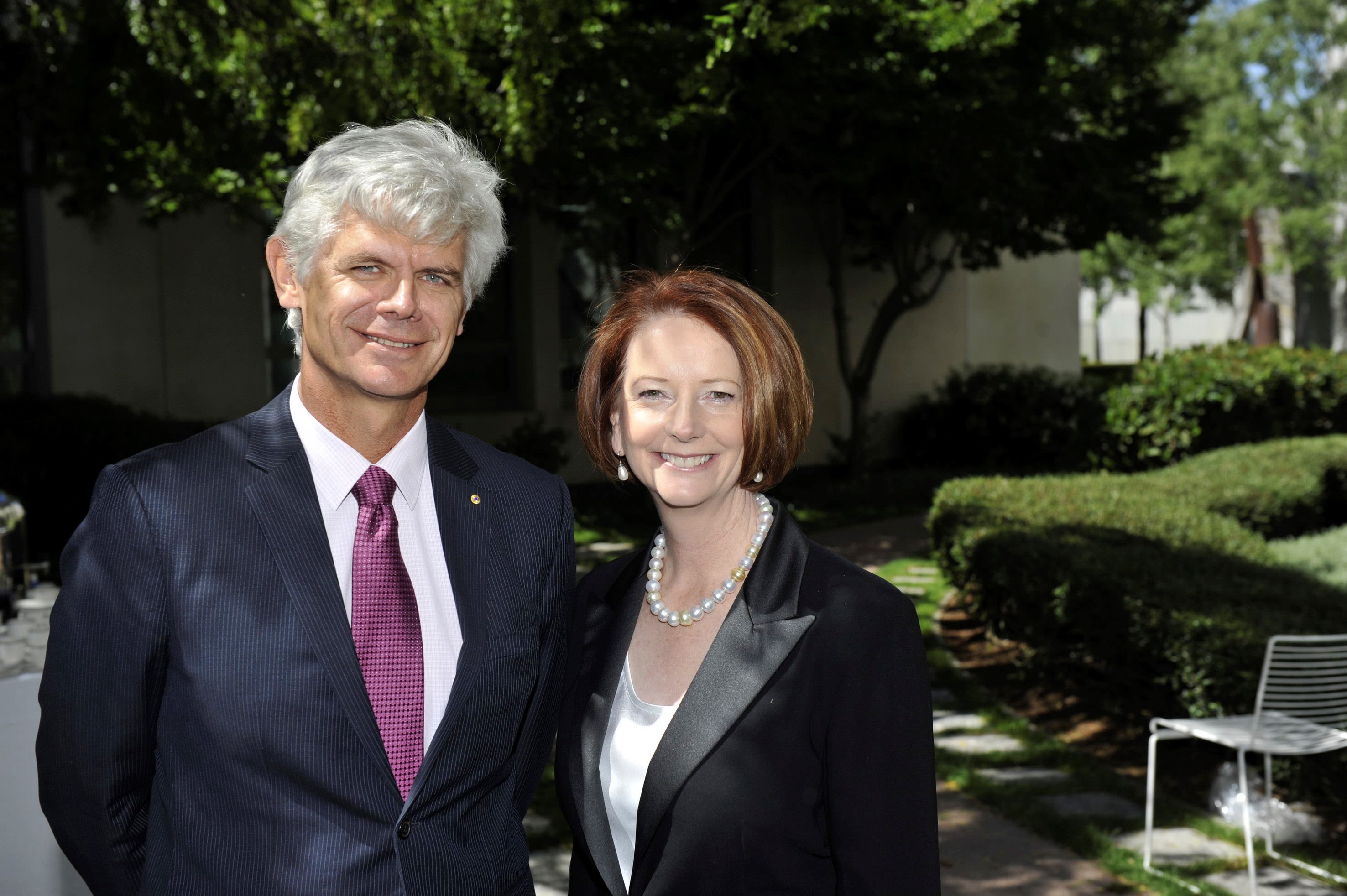 An image of Ian Kemish with former Australian prime minister Julia Gillard at a function to thank the Australian High Commision team for their consular work in Papua New Guinea.