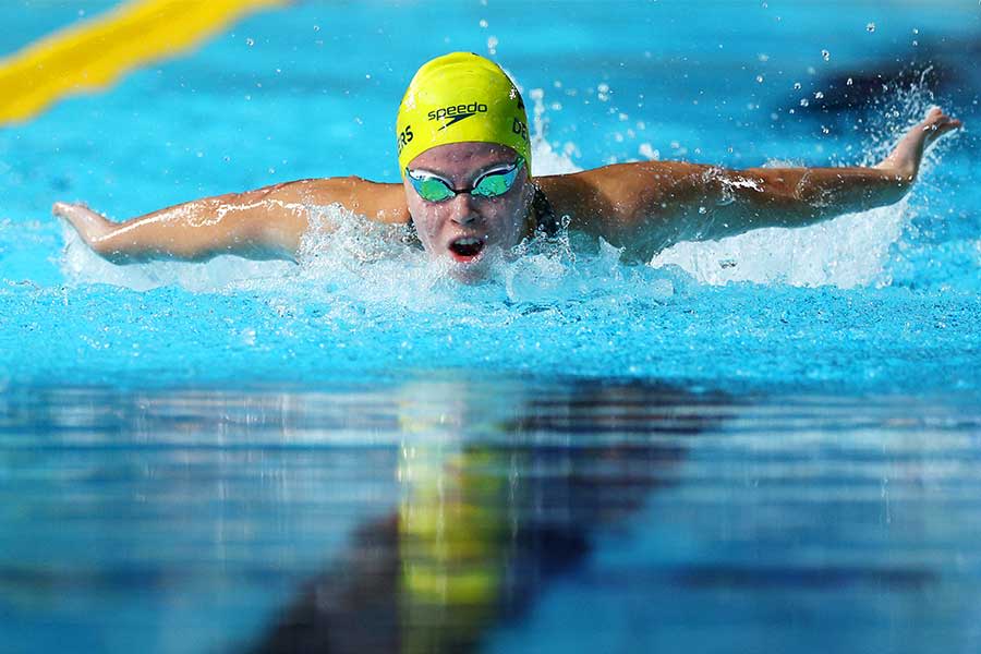 An image of UQ student Elizabeth Dekkers in action in the pool during the Commonwealth Games in Birmingham.